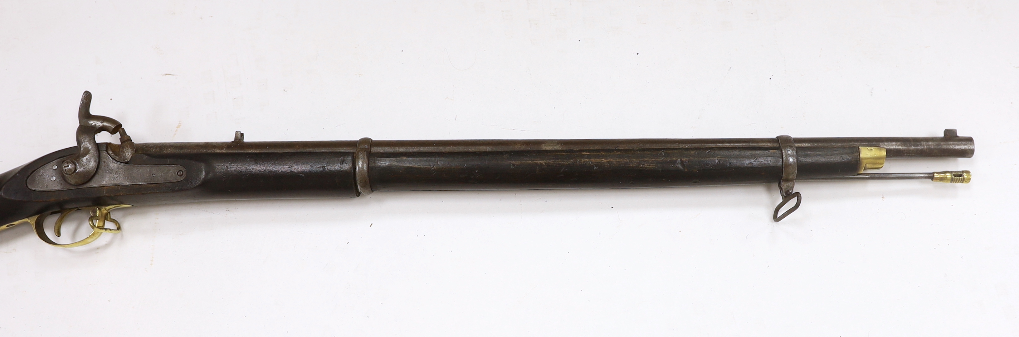 A Victorian percussion cap rifle (Tower Carbine), lock stamped 1859 TOWER and VR cypher, two barrel bands and compartment in stock, barrel 74cm